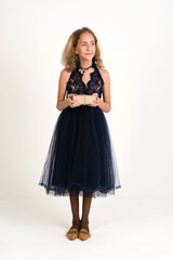 Fototapeta premium Happy teenage girl on white background with Christmas gift