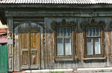 Tumen, Russia - June 12 2019: View of a street in Tyumen, Russia. Typical Russian wooden house. Historical part of the city.