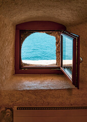 window in the wall facing the sea
