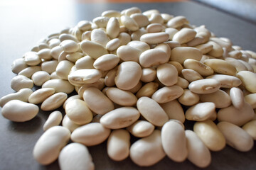 Heap of ripe beans for food, seeds on the table