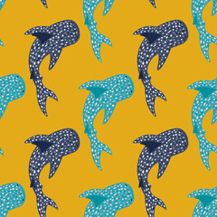 Bright contrast seamless animal pattern with blue and navy whale shark shapes. Yellow background.