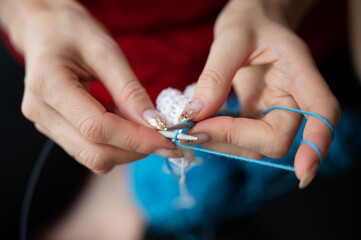 Closeup view of woman knitting