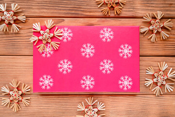 Festive christmas box with white snowflake print. Toy Straw Snowflakes