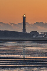Fototapeta premium The Norderney lighthouse at sunrise
