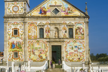  facade covered with azulejos of the Nossa Senhora do Amparo Church located in Valega, district of Aveiro, Portugal