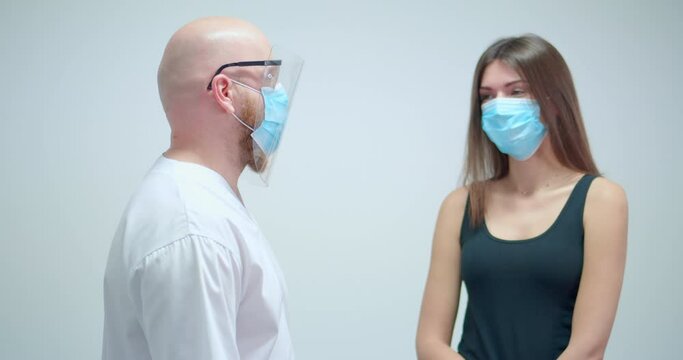 MS Masked Doctor And Patient Talking