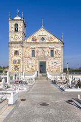 facade covered with azulejos of the Nossa Senhora do Amparo Church located in Valega, district of Aveiro, Portugal