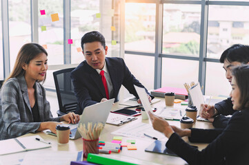 group of business people meeting in board room
