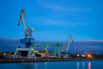 Obraz premium cranes in the harbour of Dortmund Dorsten in the 