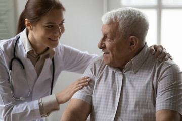 It will be all right. Friendly female doctor support encourage mature grey haired male patient....