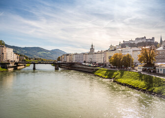 A view of fortress Hohensalzburg on a hill along Salzach River in Salzburg