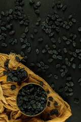 Dried raisins on white background