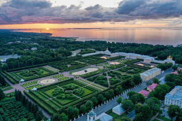 Fototapeta premium Panoramic aerial view of the park in Peterhof. Evening sunset