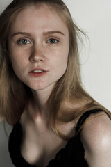 Model test with young beautiful female model with blonde hair