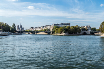 beautiful buildings along the banks of the seine seen from the boat