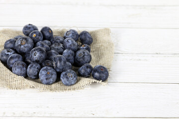 fresh blueberries on wooden background