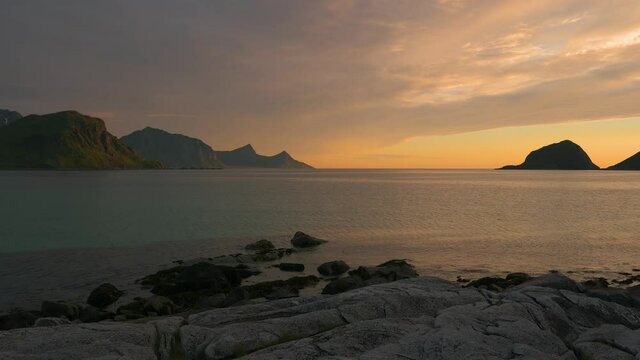 Sunset over the mountains and the sea of Lofoten Islands, Norway