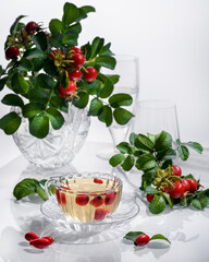 The drink from a dogrose on a white background