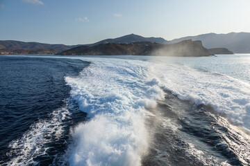 Wake in the Aegean Sea made by large ship. Ios Island, Greece.