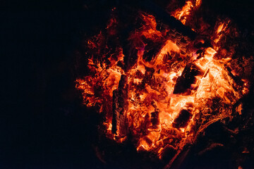 Fototapeta na wymiar bright embers of a burning fire