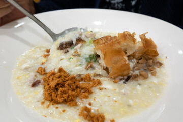congee with pork and century eggs