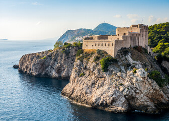 Fototapeta na wymiar View of the medieval fortress on a rock in the Adriatic sea near the city of Dubrovnik