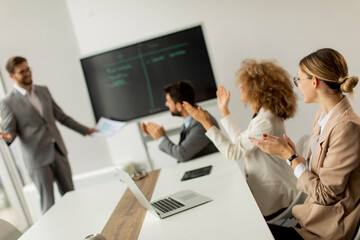 Multiethnic young business people working together in the office