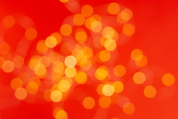 Christmas holiday background with festive bokeh on red background. Ready-to-install products. blur and bokeh. holiday blur lights. copy space. space for text