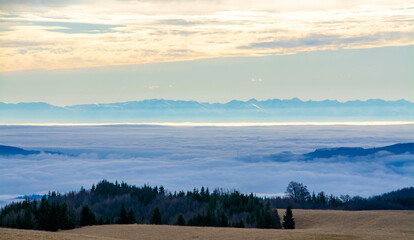 landscape with a sea of fog in the valley seen from the mountain
