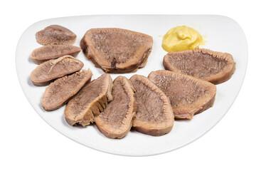 portion of sliced boiled beef tongue on white plate isolated on white background