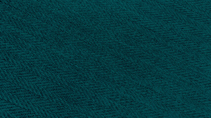 tidewater green color texture of the herringbone pattern fabric. trendy dark blue and green color knit fabric with geometric patterns of wool and cotton.