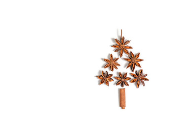 Creative, Christmas and New Year, Winter composition. star anise and cinnamon sticks on a white background. flat lay, copy space