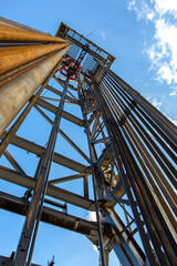 Fototapeta premium Oil well drilling rig, in terms of inner drill pipes and equipment Appearance