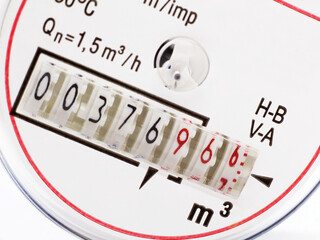 Water meter on a white background. Accounting and saving of natural resources.