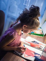 girl examining a fashion magazine