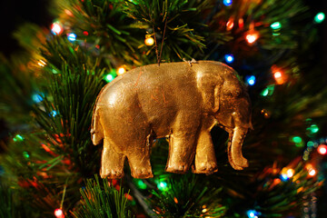 The golden elephant. Vintage Christmas ornament. Antiques DRESDEN Cardboard.