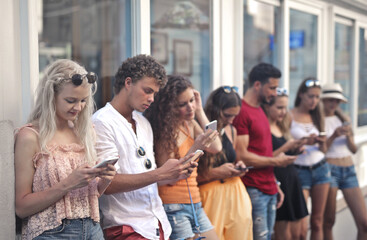 group of young people chat with smartphone