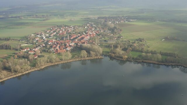 Drone Aerial of the Lake Seeburg Seeburger See on a beautiful sunday morning in the Harz national Park near G&ouml;ttingen in central germany.