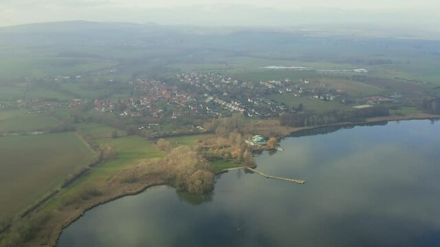 Drone Aerial of the Lake Seeburg Seeburger See on a beautiful sunday morning in the Harz national Park near G&ouml;ttingen in central germany.