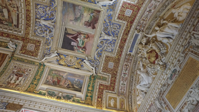 Rome, Italy - 16 June, 2017: Interior view of paintings and ceiling in Vatican museum