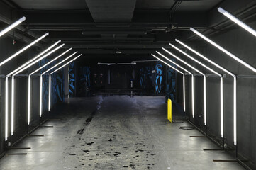 Selective focus. Photo Illumination with glowing lines abstract fluorescent background in black and...