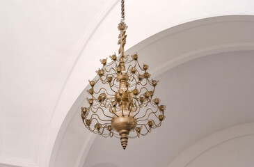 Antique 19th century chandelier in an old Christian church