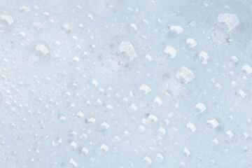 Foam bubble from soap or shampoo for washing isolated on white background from above