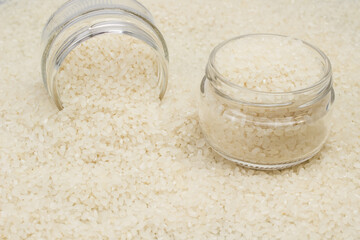 White round rice in two glass jars