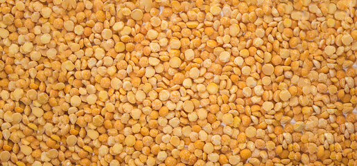 yellow dry peas background texture. banner