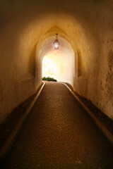 alley with light in castle in Lisbon, Portugal