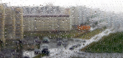 raindrops on glass texture background rain. banner