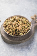 Green aromatic cardamom pods.