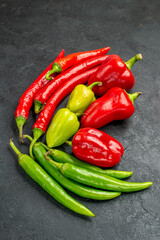front view fresh peppers on dark background ripe spicy hot