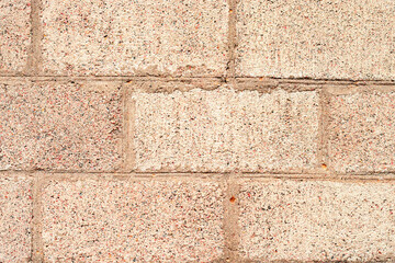 Obraz premium Texture of a brick wall with cracks and scratches which can be used as a background